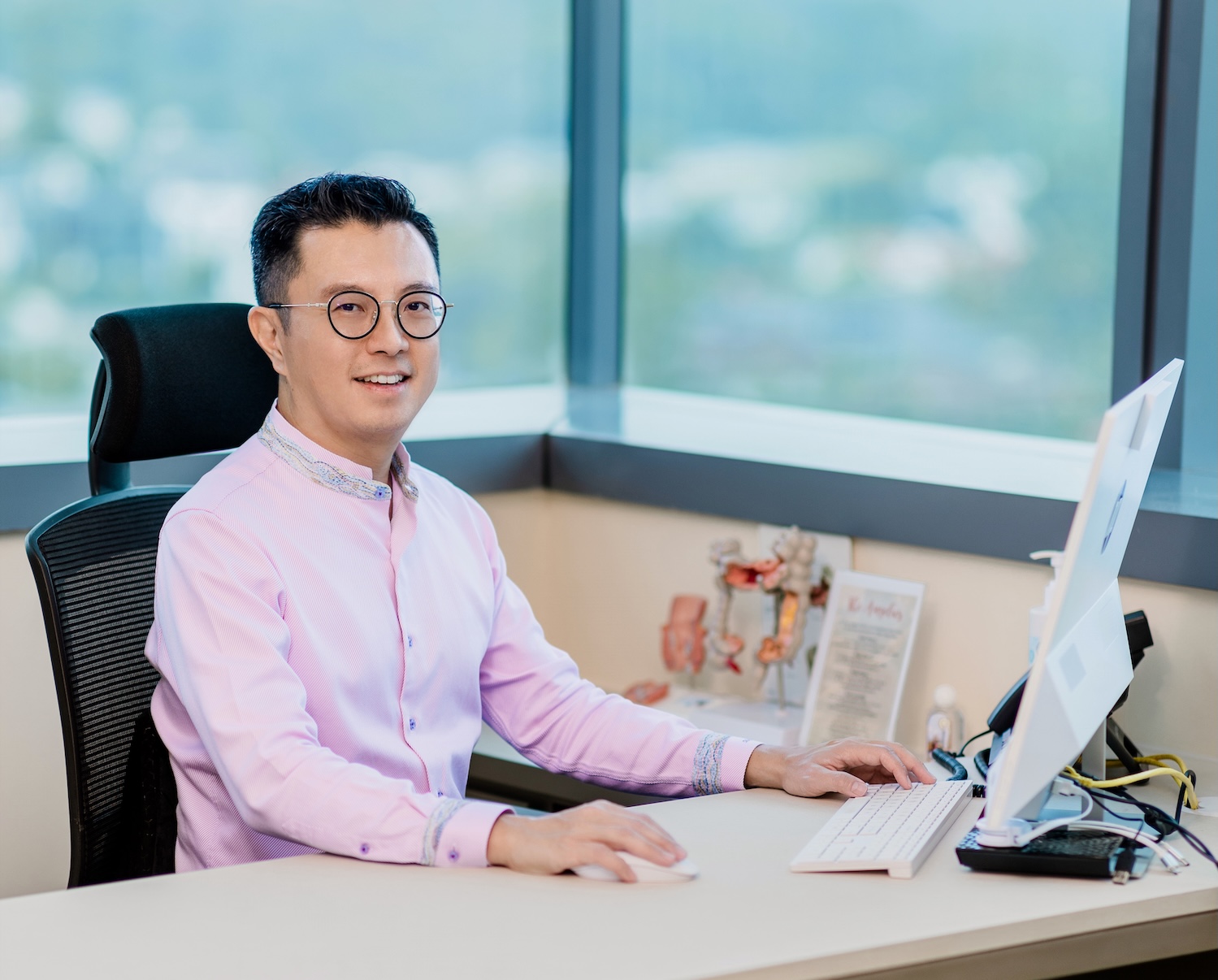 Dr Mark Wong at his desk